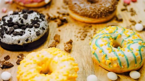 Colorful Donuts with Various Toppings on Display
