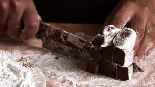 Professional Chief Works with Chocolate, Isolated on White Background