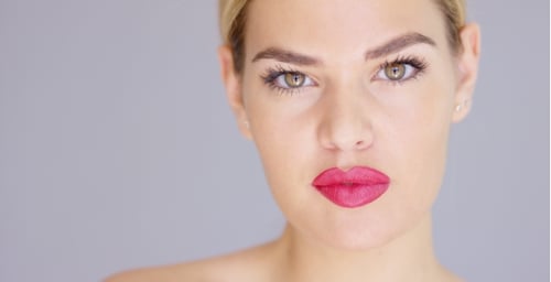 Close-Up of Young Woman with Pink Lipstick