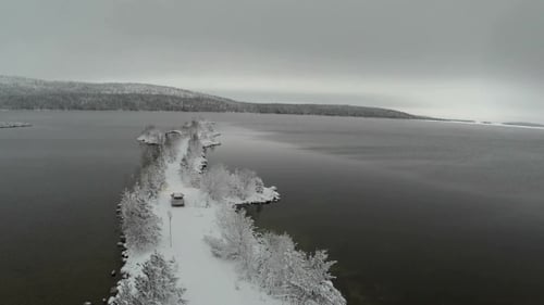 Car Driving on Winter Island Road in the River, Aerial View