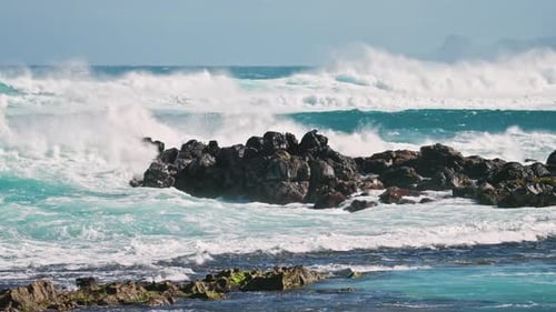 Dangerous Sea Waves on Rocky Beach Blue Ocean Waves Breaking on Sea Rocks