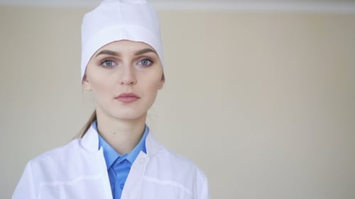 Young Adult Woman in Lab Coat Close Up