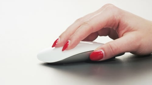 Hand Clicking a White Computer Mouse, Close Up