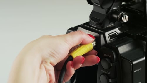 Connecting a Cable to a Black Video Camera