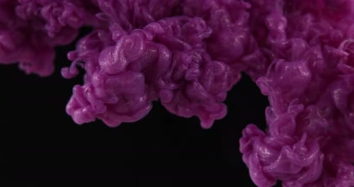 Abstract Purple Ink Swirls in Water