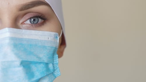 Medical Professional Wearing Mask in Hospital Close-Up