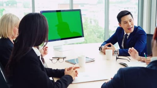 Business People in the Conference Room with Green Screen