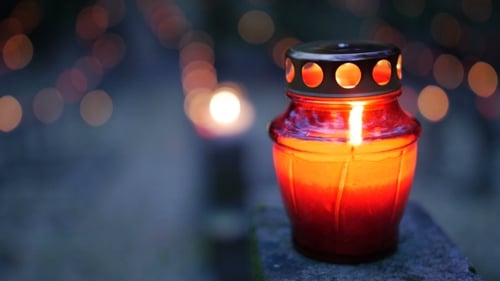 Cemetery at Night with Colorful Candles for All Saints Day. All Saints' Day Is a Solemnity