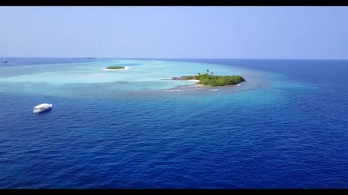 Aerial landscape of paradise tourist beach break by clear sea and white sand background of a dayout