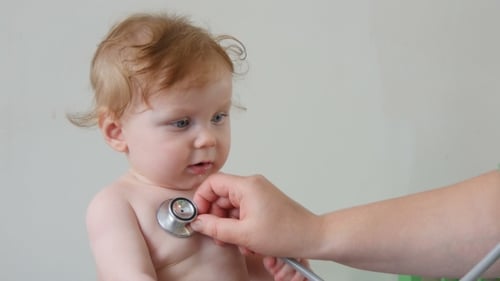Infant Examined with Stethoscope During Doctor's Visit