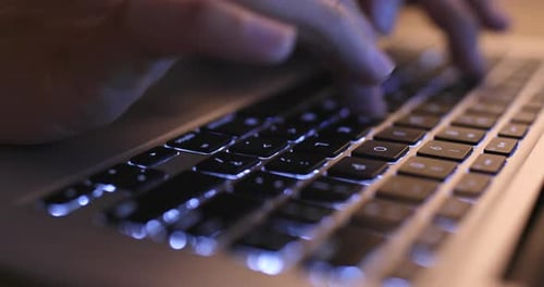 Typing on Laptop Computer