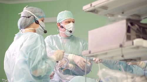 Medical Team Performing Surgery in Hospital Operating Room