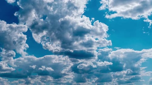 Clouds Moving Slowly in the Blue Sky