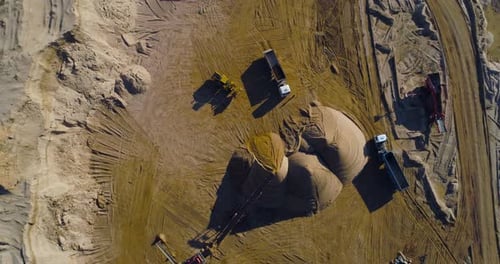 Heavy Machinery at Work in Rural Sand Quarry