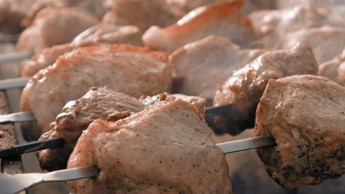 Barbecue Skewers with Meat Cooking on the Grill