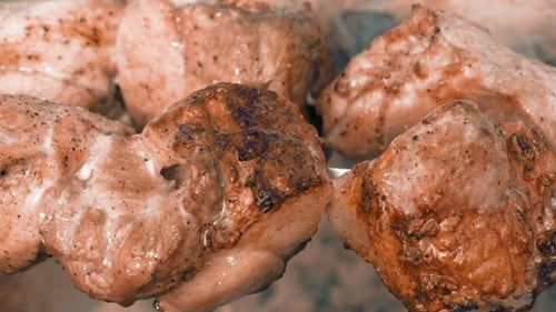 Barbecue Skewers with Meat Cooking on the Grill