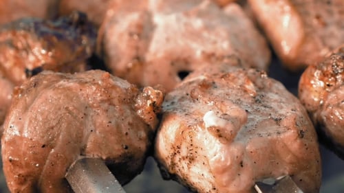 Barbecue Skewers with Meat Cooking on the Grill