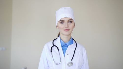 Young Woman Doctor in Medical Uniform