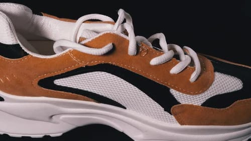 Fashionable Athletic Shoe Detail on Dark Background