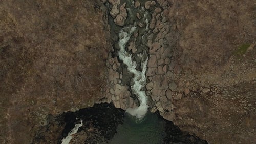 Svartifoss Waterfall Surrounded By Basalt in Iceland