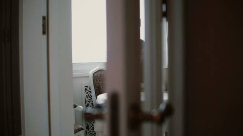 Woman Uses Laptop and Enjoying Morning Coffee on a Bright Dining. Slider To the Left, View Through