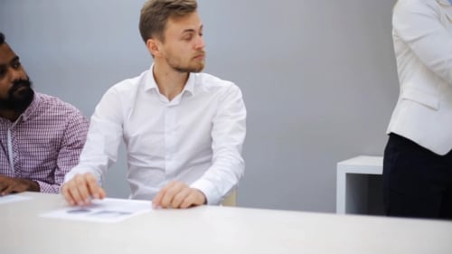 Business Team with Scheme at Presentation