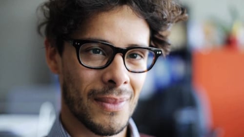 Close up of Smiling Male with Glasses