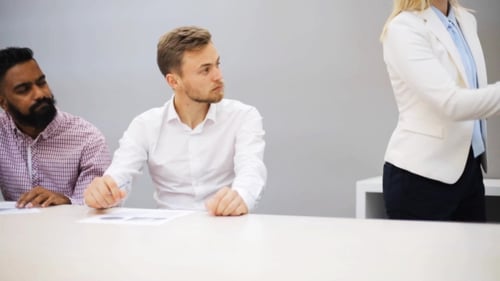 Business Team with Scheme at Presentation