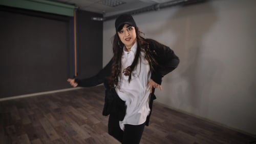 The Woman in the Free Time in Studio Takes Dancing