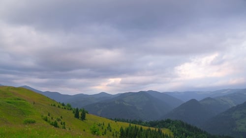 Mountain Landscape with Clouds at Sunset.