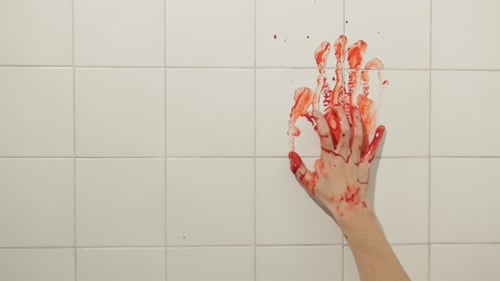 Bloody Handprint on Tile Wall