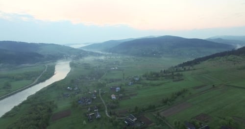 Village on a Hilly Area on the River Bank