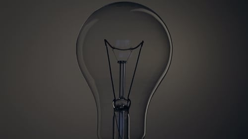 Light Bulb on Black Background.
