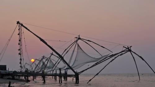 Chinese Fishnets on Sunset. Fort Kochin, Kochi, Kerala, India