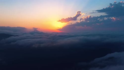 Aerial View of Majestic Clouds at Sunset