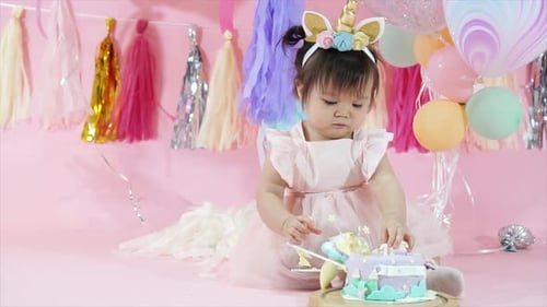 Adorable Toddler Celebrates Her Birthday with Cake