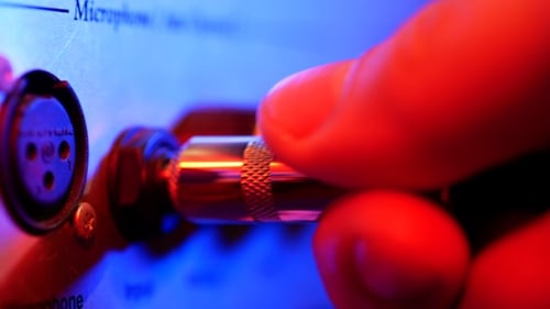 Audio Cable Plugged into Equipment in Close-Up Shot