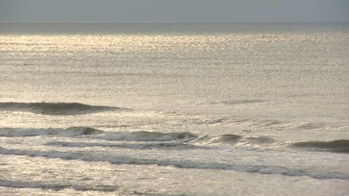 Sun Reflection in Waves