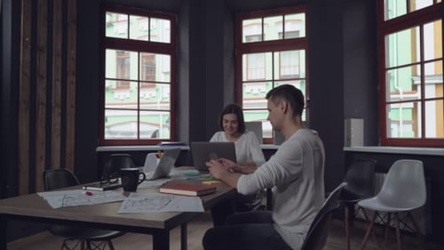 Adult Guy Holding Two Cups Coming in Office