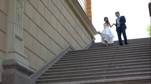 Wedding Couple Walking Downstairs.