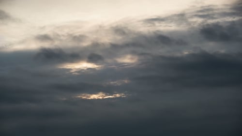 Clouds Moving in the Blue Sky and Sun