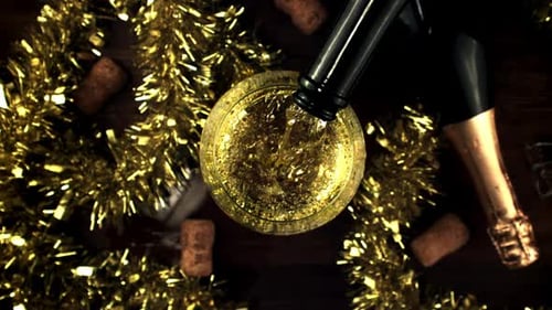 Glass of Champagne Being Poured For Christmas