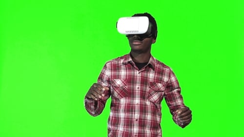 African Man Wearing VR Googles on Green Screen