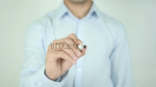 Writing the Word Violence on Clear Surface