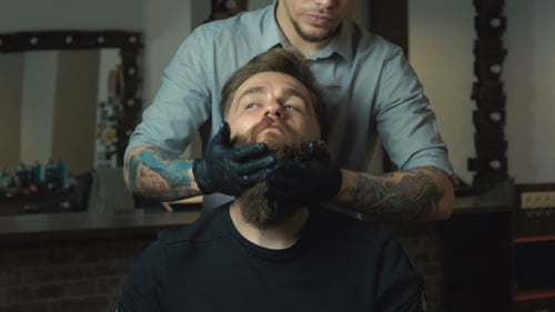 Bearded Man Gets Groomed in Barbershop