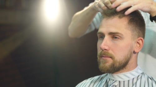 Man Getting Hair Styled in Barbershop Close-up