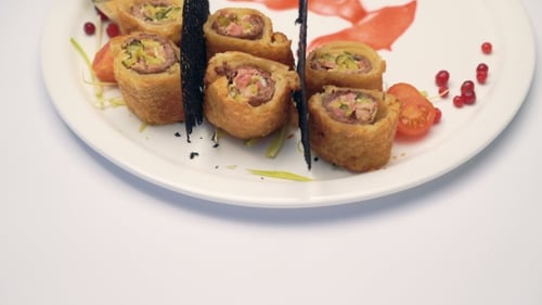 Appetizing Beef Rolls with Elegant Garnishes Close Up