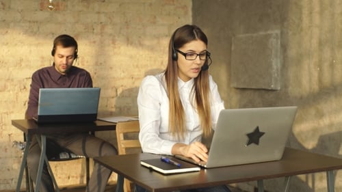 Operators Using a Computer in a Call Center