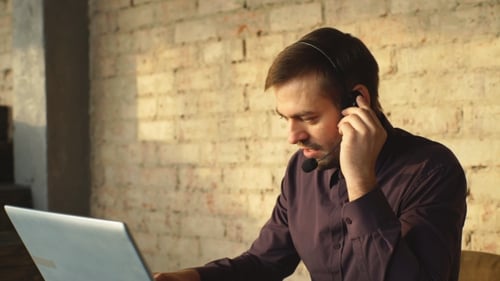 Call Center Agent Speaking with Costumer