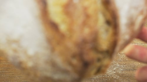 Fresh Baked Loaf on Wooden Surface